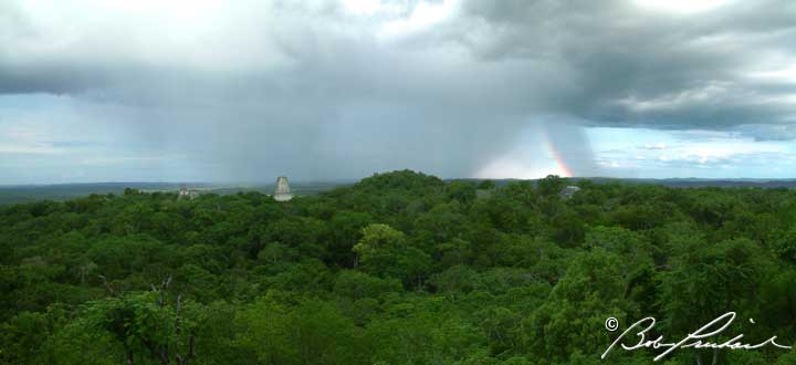 Tikal, Guatemala: Rainbow Behind The Mayan Temples Panoramic