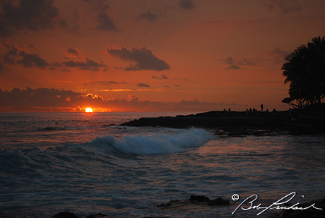 Kona Hawaii: Warm Glowing Sunset Over Breaking Wave