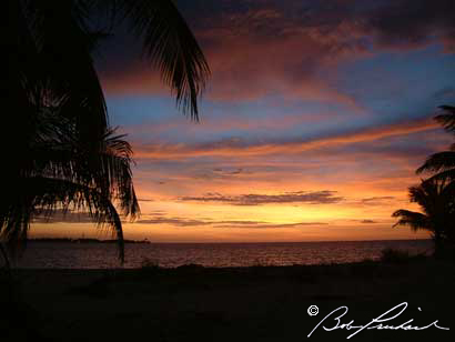 Belize: Northern Caye, Rising Sun Over Sandbore Caye